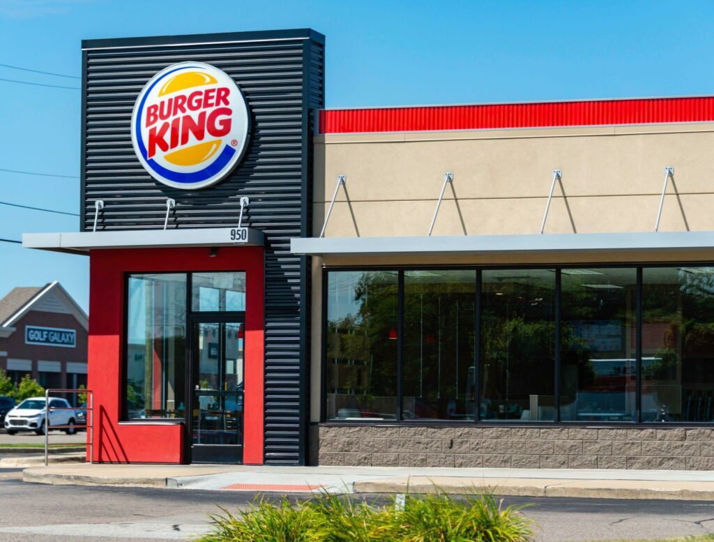 why did the 90-unit burger king operator declare bankruptcy